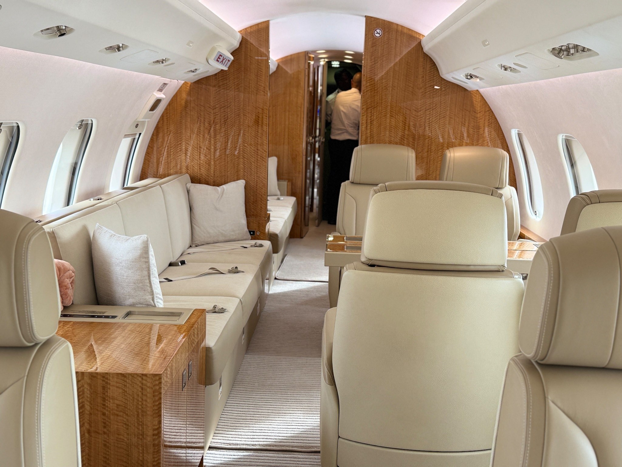 Cream and wood private jet cabin